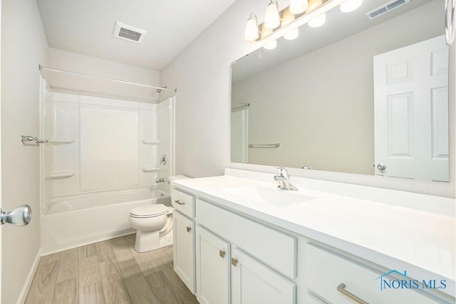 1487 Lee Ann Ave, Defiance, OH 43512 - bathroom with vanity, wood finished floors, and tub / shower combination