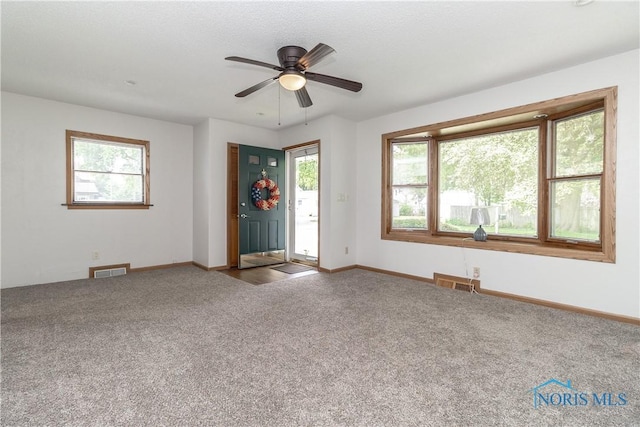512 State St, Elmore, OH 43416 - unfurnished room featuring carpet floors and ceiling fan