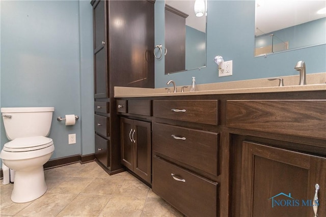 512 State St, Elmore, OH 43416 - bathroom with double vanity and tile patterned floors