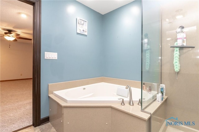 512 State St, Elmore, OH 43416 - bathroom featuring ceiling fan and a garden tub
