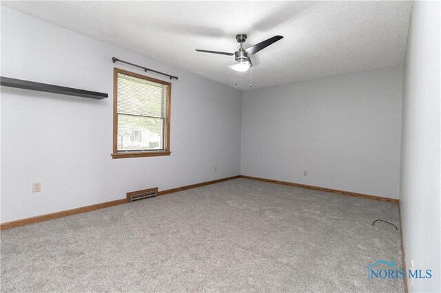 512 State St, Elmore, OH 43416 - carpeted spare room with a ceiling fan and baseboards