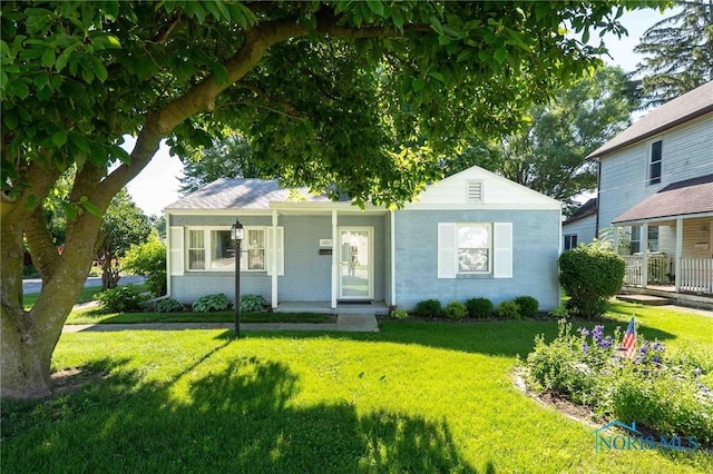 1201 S Blanchard St, Findlay, OH 45840 - view of front of house featuring a porch and a front yard