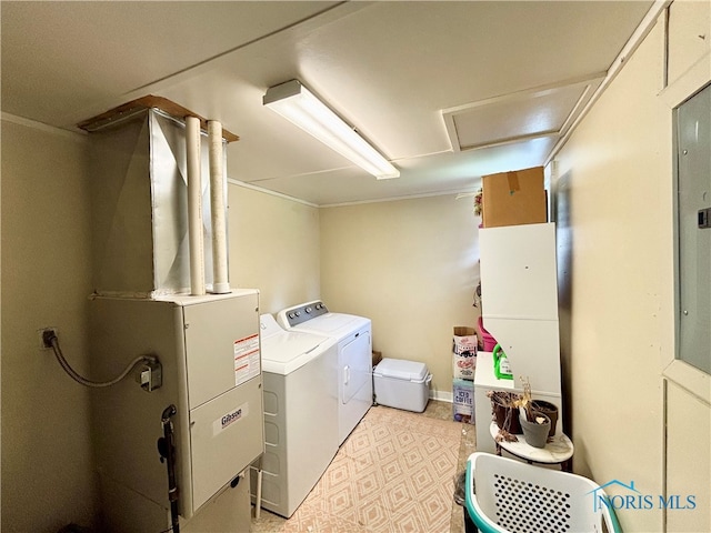 307 Spencerville St, Hicksville, OH 43526 - laundry area featuring washing machine and dryer, heating unit, and light floors