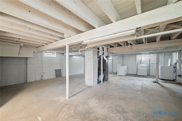1247 Hugo St, Maumee, OH 43537 - basement featuring washing machine and dryer