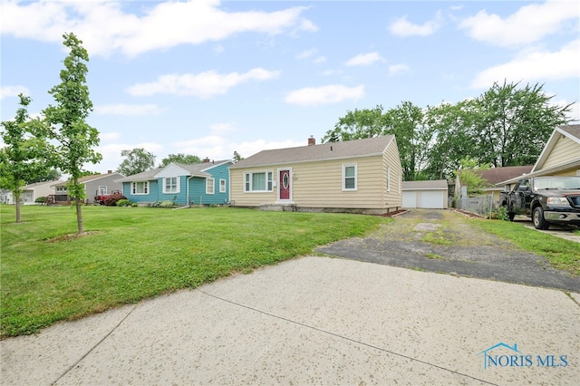 1247 Hugo St, Maumee, OH 43537 - ranch-style home featuring a garage, a front lawn, a chimney, an outdoor structure, and a residential view