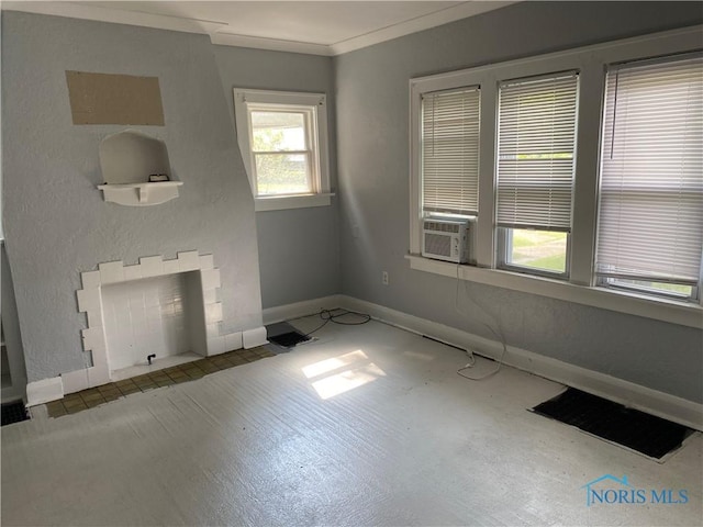 2615 Greenway St, Toledo, OH 43607 - unfurnished living room featuring cooling unit, carpet flooring, crown molding, and a textured wall
