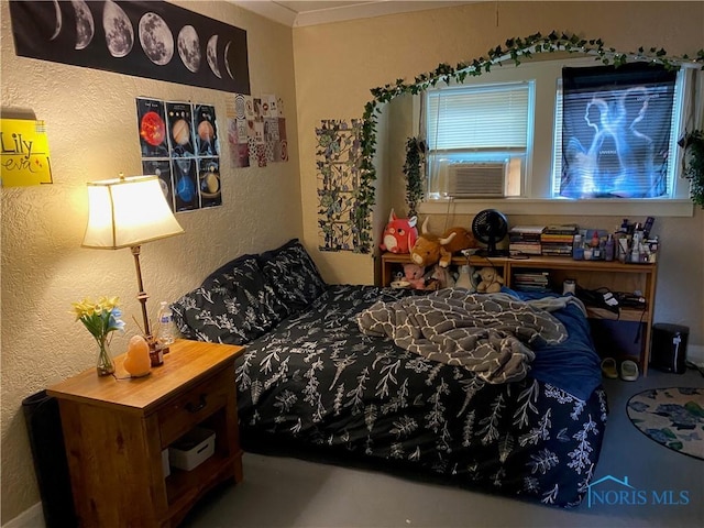 2615 Greenway St, Toledo, OH 43607 - bedroom featuring a textured wall and cooling unit