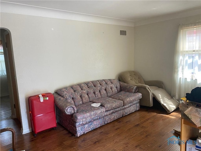 2534 Montebello Rd, Toledo, OH 43607 - living area with arched walkways and wood finished floors