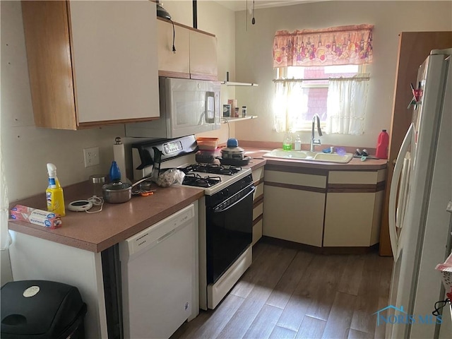 2534 Montebello Rd, Toledo, OH 43607 - kitchen with white appliances, light wood-type flooring, white cabinetry, light countertops, and open shelves