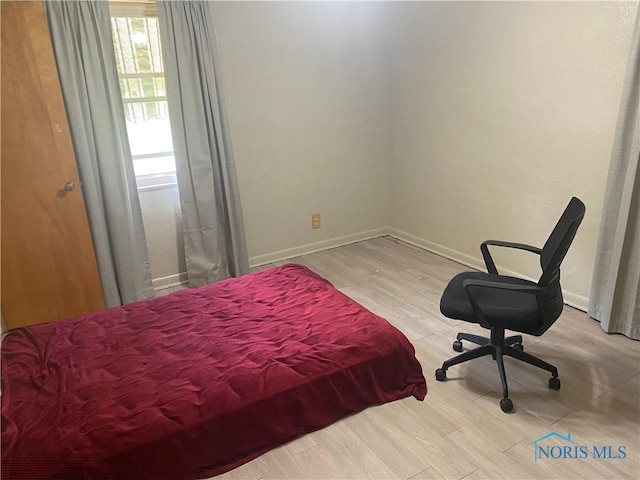 2534 Montebello Rd, Toledo, OH 43607 - bedroom featuring wood finished floors and baseboards