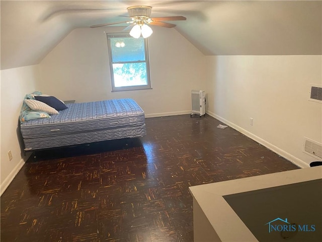 2534 Montebello Rd, Toledo, OH 43607 - bedroom with radiator, lofted ceiling, and a ceiling fan