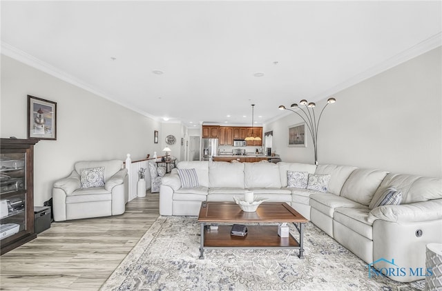 11200 E Bayshore Rd Unit D, Marblehead, OH 43440 - living room featuring light wood-type flooring, crown molding, and recessed lighting