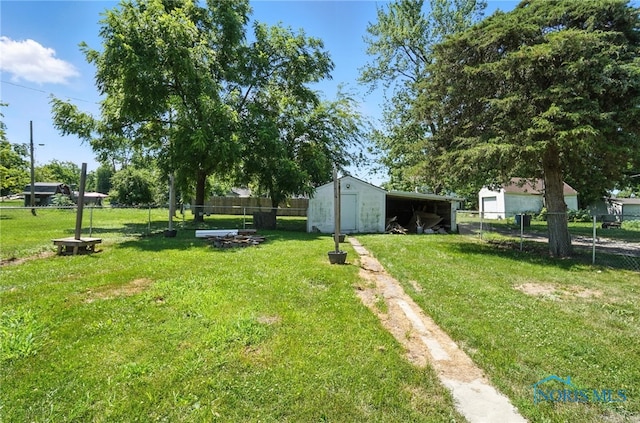 709 W Jackson St, Paulding, OH 45879 - view of yard with an outbuilding