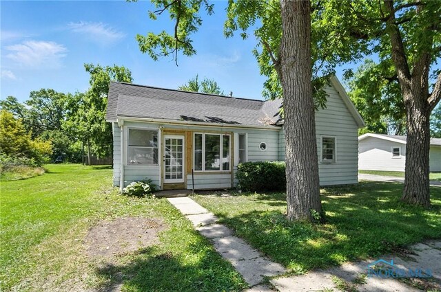 709 W Jackson St, Paulding, OH 45879 - view of front of house featuring a front yard