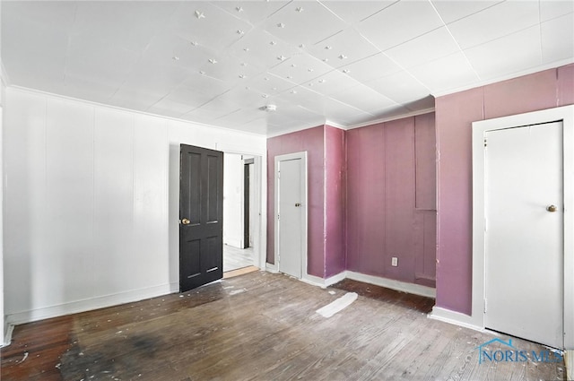 709 W Jackson St, Paulding, OH 45879 - entryway with wood finished floors and crown molding