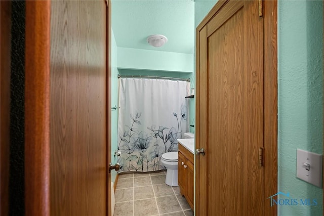 2958 Penrose Ave, Toledo, OH 43614 - full bathroom with vanity, tile patterned floors, and a shower with shower curtain