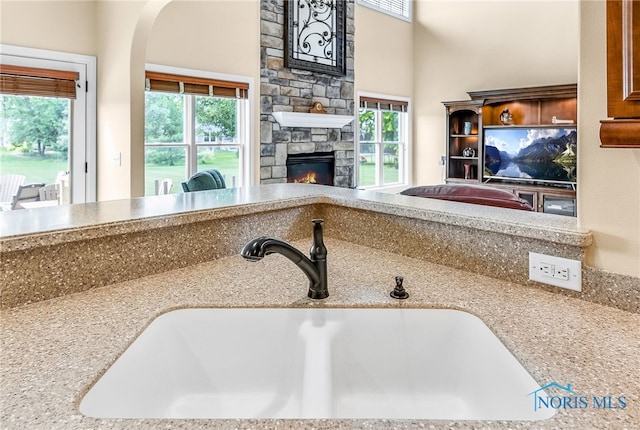 9701 Preakness Ln, Whitehouse, OH 43571 - detailed view of a stone fireplace and arched walkways