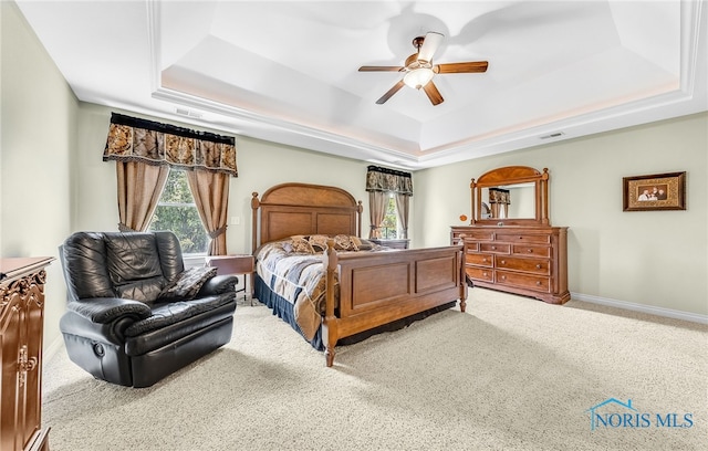 9701 Preakness Ln, Whitehouse, OH 43571 - carpeted bedroom with a tray ceiling and a ceiling fan