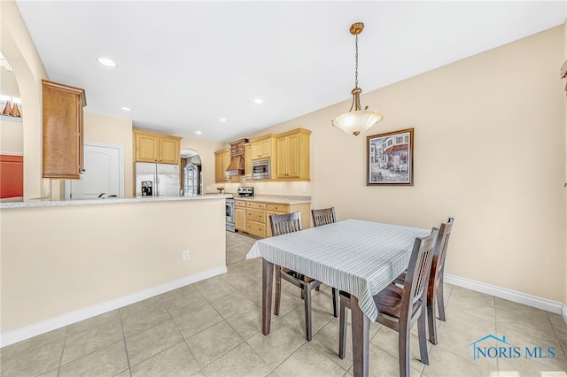9701 Preakness Ln, Whitehouse, OH 43571 - dining room featuring arched walkways, light tile patterned floors, and recessed lighting