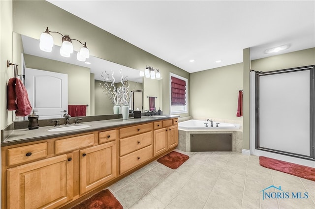 9701 Preakness Ln, Whitehouse, OH 43571 - full bath with double vanity, a garden tub, a shower stall, and tile patterned flooring