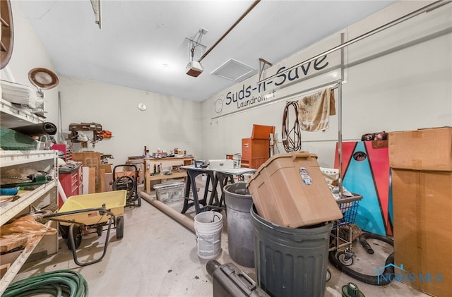 9701 Preakness Ln, Whitehouse, OH 43571 - garage featuring a garage door opener and a workshop area