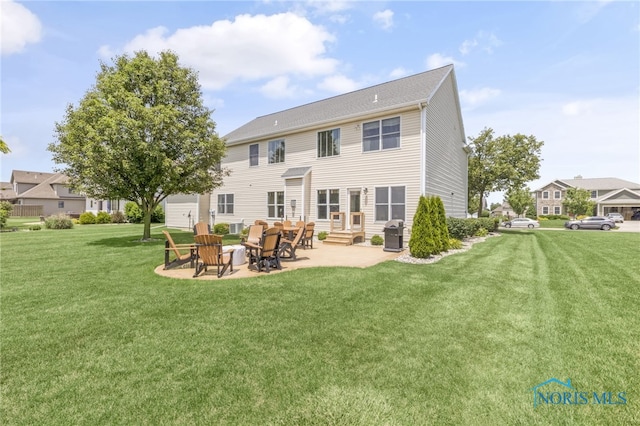 9701 Preakness Ln, Whitehouse, OH 43571 - back of house featuring a patio, a yard, and entry steps