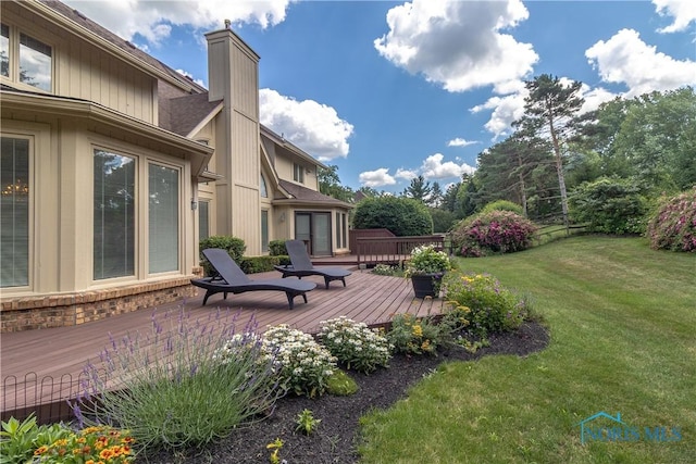 5303 Spring Crk, Sylvania, OH 43560 - view of green lawn with a deck