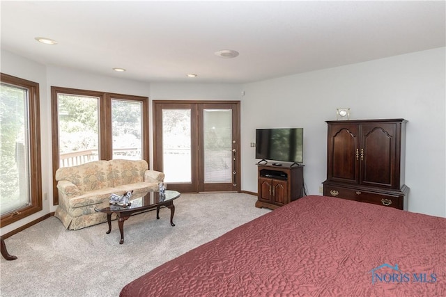 5303 Spring Crk, Sylvania, OH 43560 - bedroom featuring access to outside, light carpet, multiple windows, and recessed lighting