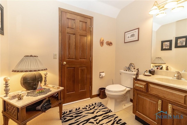 5303 Spring Crk, Sylvania, OH 43560 - bathroom featuring vanity, tile patterned flooring, and vaulted ceiling
