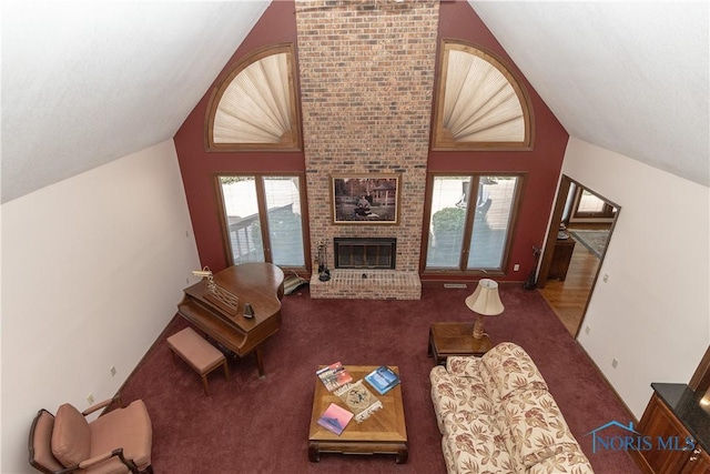 5303 Spring Crk, Sylvania, OH 43560 - living room featuring healthy amount of natural light, carpet, high vaulted ceiling, and a fireplace