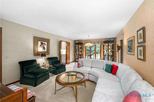 7118 Jamesford Dr, Toledo, OH 43617 - carpeted living area with wallpapered walls and baseboards