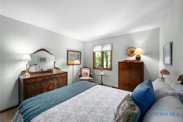 7118 Jamesford Dr, Toledo, OH 43617 - bedroom featuring baseboards and carpet
