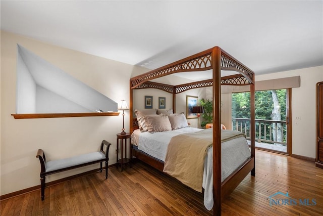 7118 Jamesford Dr, Toledo, OH 43617 - bedroom with hardwood / wood-style flooring and access to exterior