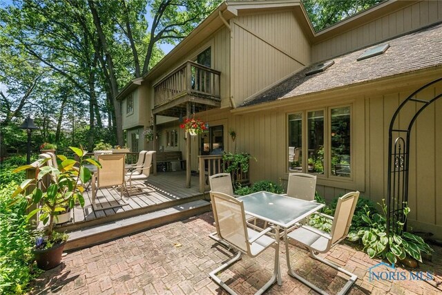 7118 Jamesford Dr, Toledo, OH 43617 - patio / terrace featuring outdoor dining area, a deck, and a patio