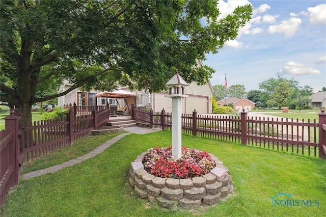 706 Grandview Ct, Elmore, OH 43416 - fenced backyard featuring a gazebo