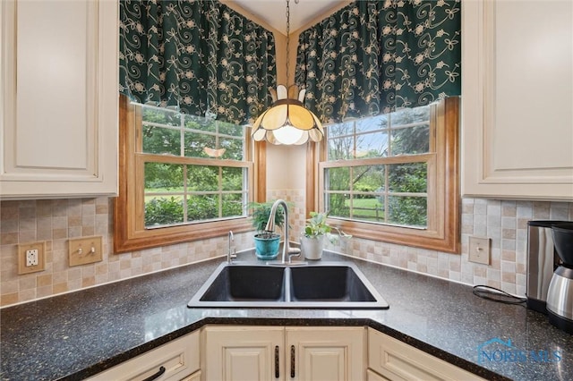 706 Grandview Ct, Elmore, OH 43416 - kitchen with backsplash, white cabinetry, and dark stone counters