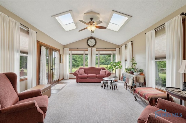 706 Grandview Ct, Elmore, OH 43416 - sunroom featuring a skylight, french doors, carpet, and vaulted ceiling