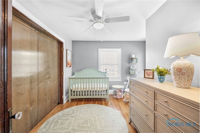 3162 Glanzman Rd, Toledo, OH 43614 - bedroom with light wood-style floors, a closet, and ceiling fan