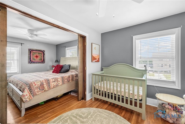3162 Glanzman Rd, Toledo, OH 43614 - bedroom featuring wood finished floors and a ceiling fan