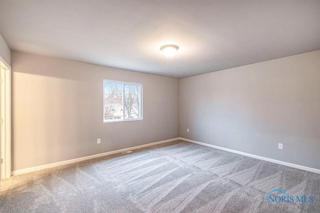 1492 Lee Ann Ave, Defiance, OH 43512 - carpeted empty room with baseboards