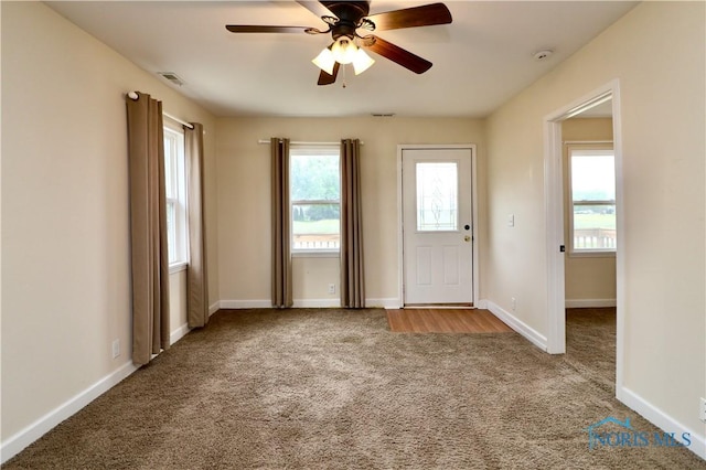 4134 Angola Rd, Toledo, OH 43615 - entrance foyer featuring carpet flooring and a ceiling fan