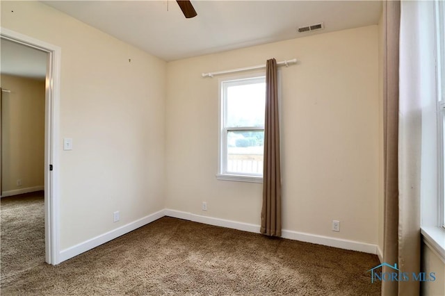 4134 Angola Rd, Toledo, OH 43615 - carpeted empty room featuring a ceiling fan and baseboards
