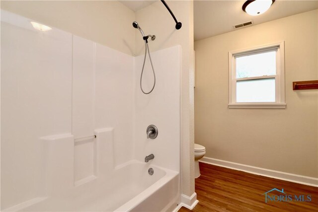 4134 Angola Rd, Toledo, OH 43615 - full bathroom with shower / bath combination and wood finished floors