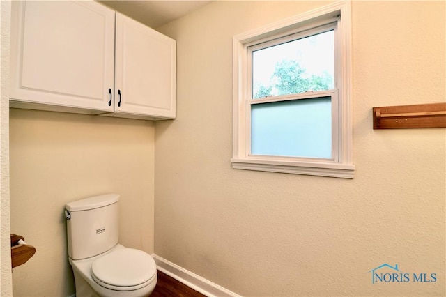 4134 Angola Rd, Toledo, OH 43615 - bathroom with baseboards and wood finished floors
