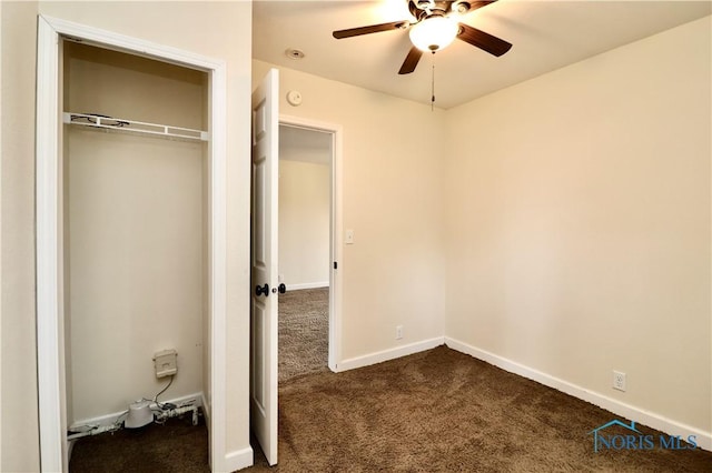 4134 Angola Rd, Toledo, OH 43615 - unfurnished bedroom with dark colored carpet, a closet, and a ceiling fan