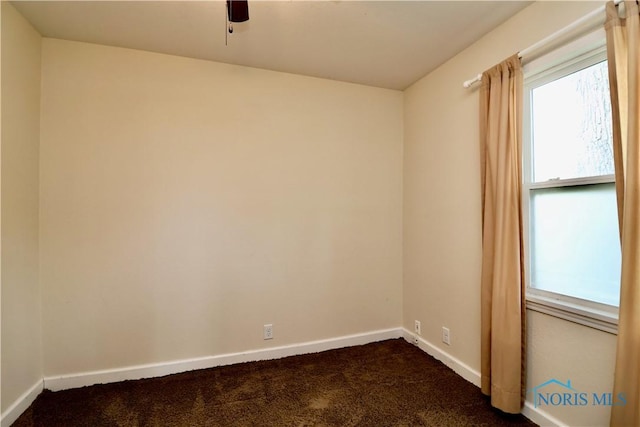 4134 Angola Rd, Toledo, OH 43615 - unfurnished room with dark colored carpet and ceiling fan
