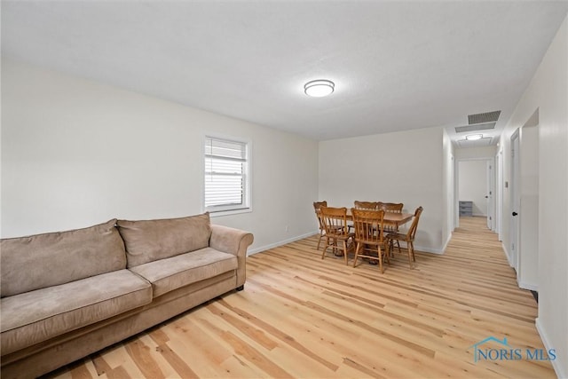 1118 Michigan Ave, Maumee, OH 43537 - living area with light wood finished floors and baseboards