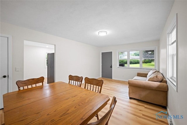 1118 Michigan Ave, Maumee, OH 43537 - dining space with light wood-style flooring and baseboards