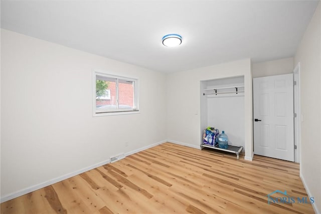1118 Michigan Ave, Maumee, OH 43537 - unfurnished bedroom with light wood-style floors and a closet