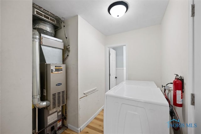 1118 Michigan Ave, Maumee, OH 43537 - washroom with washer and dryer and light wood-style floors